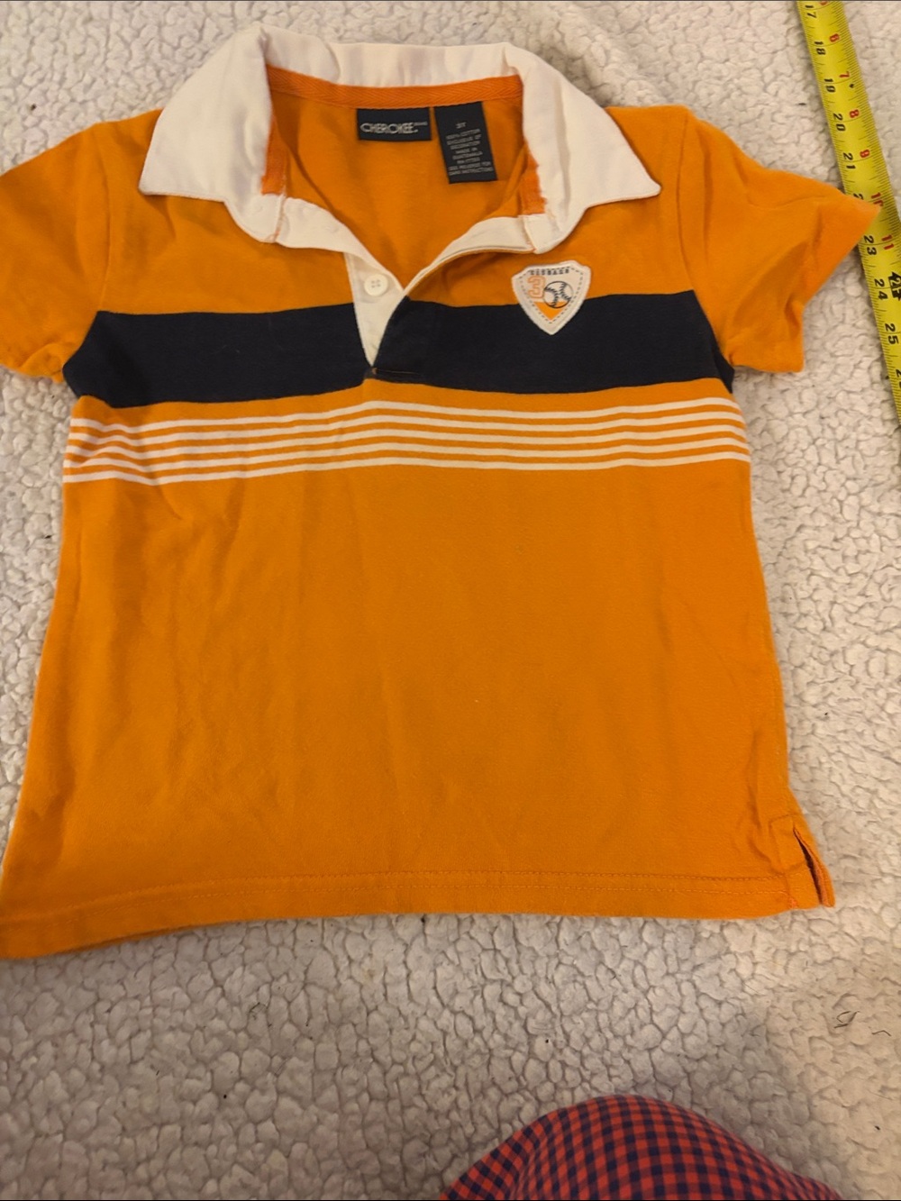 Cherokee Orange Polo with Navy Stripe and White Collar
